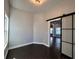 A brightly lit empty room features a sliding barn door at 958 Joseph E Boone Nw Blvd, Atlanta, GA 30314