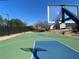 Community basketball court with lighting and seating available at 615 Arncliffe Ct, Alpharetta, GA 30005