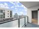 Enjoy city skyline views from this private balcony featuring glass railings and a great view at 1280 W Peachtree Nw St # 3303, Atlanta, GA 30309