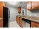 Kitchen features granite countertops and stainless steel appliances at 1280 W Peachtree Nw St # 3303, Atlanta, GA 30309