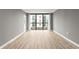 Bright living area with floor-to-ceiling windows and plenty of room at 1280 W Peachtree Nw St # 3303, Atlanta, GA 30309