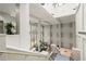 A luxurious lobby featuring high ceilings, skylights, elegant columns, and seating areas at 1280 W Peachtree Nw St # 3303, Atlanta, GA 30309