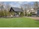 Spacious backyard with a charming outdoor kitchen, bar and gazebo at 1366 Kings Park Nw Dr, Kennesaw, GA 30152