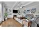 Inviting living room boasts a cozy fireplace, built-in shelving, and ample natural light at 1366 Kings Park Nw Dr, Kennesaw, GA 30152