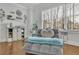 Comfortable sitting area with hardwood floors, a lounger, and natural light from the windows at 1366 Kings Park Nw Dr, Kennesaw, GA 30152