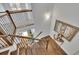 Beautiful staircase featuring wrought iron railing and stained wood floors at 1366 Kings Park Nw Dr, Kennesaw, GA 30152