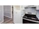 Bright kitchen features white cabinets, white countertops and stainless steel appliances at 1650 Seayes Sw Rd, Mableton, GA 30126