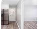 This kitchen features stainless steel appliances and a doorway that leads to another room at 1650 Seayes Sw Rd, Mableton, GA 30126