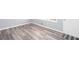 Inviting space featuring wood grain flooring, white trim, and soft gray walls with natural light at 1650 Seayes Sw Rd, Mableton, GA 30126
