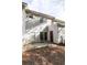 Back of the house features a sliding door and a concrete patio area for relaxing at 2021 Austin Park Cir, Decatur, GA 30032