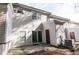 Exterior view of the home featuring sliding glass doors and a private patio area at 2021 Austin Park Cir, Decatur, GA 30032