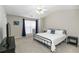 Comfortable bedroom featuring a metal frame bed, neutral color, and natural light at 2021 Austin Park Cir, Decatur, GA 30032
