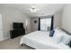 Spacious bedroom with an airy ceiling, large TV, and a serene atmosphere at 2021 Austin Park Cir, Decatur, GA 30032