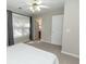 This bedroom features a light, airy vibe with carpet, a ceiling fan, and curtains at 2021 Austin Park Cir, Decatur, GA 30032