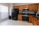 Bright kitchen featuring stainless steel appliances and light wood cabinets at 2021 Austin Park Cir, Decatur, GA 30032