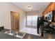 Kitchen featuring stainless steel appliances and view into an adjacent room at 2021 Austin Park Cir, Decatur, GA 30032