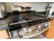 Stainless steel gas range with sealed burners, digital display, and smooth, continuous grates at 2021 Austin Park Cir, Decatur, GA 30032