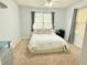 Sun-filled bedroom with plush carpet and neutral decor at 235 Windcroft Nw Ln, Acworth, GA 30101