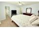 Bedroom featuring an ensuite bathroom and walk-in closet at 235 Windcroft Nw Ln, Acworth, GA 30101