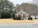 Neighborhood gazebo featuring mature landscaping and views of common areas and surrounding trees at 235 Windcroft Nw Ln, Acworth, GA 30101