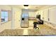 Kitchen area with granite countertops and stainless steel appliances and a breakfast bar at 235 Windcroft Nw Ln, Acworth, GA 30101