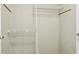 A walk-in closet with wire shelving and plenty of room for storage in the bedroom at 2551 Bradford Ne Sq, Atlanta, GA 30345