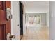 A welcoming entryway featuring tile flooring and a view of the backyard through sliding glass doors at 2551 Bradford Ne Sq, Atlanta, GA 30345