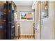 Galley kitchen with dark appliances, laminate countertops and view from window at 2551 Bradford Ne Sq, Atlanta, GA 30345