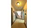 Bright hallway with neutral tones and inviting decor at 3148 Glenloch Pl, Lawrenceville, GA 30044