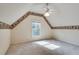 Upstairs bedroom with carpet, unique trim, and ample natural light at 775 Hales Trace Sw Way, Lilburn, GA 30047