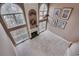 Upstairs view of living room with a fireplace flanked by windows, high ceilings, and artwork on the wall at 775 Hales Trace Sw Way, Lilburn, GA 30047