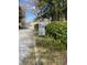 Community sign with speed limit and welcome message amid lush greenery on a sunny day at 5400 Roswell Rd # K1, Atlanta, GA 30342