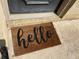 Charming 'hello' doormat welcomes you at the entrance of this home at 5400 Roswell Rd # K1, Atlanta, GA 30342