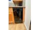 This kitchen features a built-in dishwasher under a granite countertop at 5400 Roswell Rd # K1, Atlanta, GA 30342