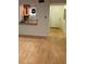 An open-concept living room with wood floors at 5400 Roswell Rd # K1, Atlanta, GA 30342