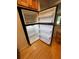 Interior view of a clean, empty refrigerator at 5400 Roswell Rd # K1, Atlanta, GA 30342