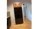 Black refrigerator in kitchen at 5400 Roswell Rd # K1, Atlanta, GA 30342