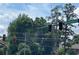 A view of the street with trees and traffic lights at 5400 Roswell Rd # K1, Atlanta, GA 30342