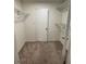 A spacious walk-in closet with shelving at 5400 Roswell Rd # K1, Atlanta, GA 30342