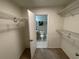 Carpeted walk-in closet with wire shelving offering convenient storage at 5400 Roswell Rd # K1, Atlanta, GA 30342