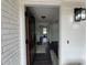 Inviting entryway showcasing modern dark wood flooring and fresh white paint at 1390 White Oak St Se, Conyers, GA 30013