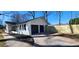 Side view of home showcasing a spacious two-car garage and newly installed wooden fence at 1390 White Oak St Se, Conyers, GA 30013