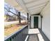 Inviting front porch with gray railing, providing a sheltered and pleasant space to relax or welcome guests at 1820 Spring St, Conyers, GA 30012