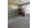 Bedroom with neutral carpet, a ceiling fan, and a window providing natural light at 57 Haven Ridge Dr, Carrollton, GA 30116