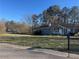 Exterior view of a well-kept home with a big front lawn at 57 Haven Ridge Dr, Carrollton, GA 30116