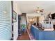 Inviting living room features hardwood floors, a ceiling fan, and an open floorplan at 327 Alderwood Ln, Atlanta, GA 30328
