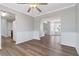 Open-concept dining and living area featuring hardwood floors at 4284 Hathaway Nw Ct, Kennesaw, GA 30144