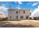 This two story home features a fenced backyard and neutral colored siding at 4284 Hathaway Nw Ct, Kennesaw, GA 30144