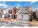Charming two-story brick home featuring a well-manicured lawn and two-car garage at 4284 Hathaway Nw Ct, Kennesaw, GA 30144