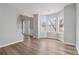 Inviting living room with hardwood floors and bay windows offering plenty of natural light at 4284 Hathaway Nw Ct, Kennesaw, GA 30144